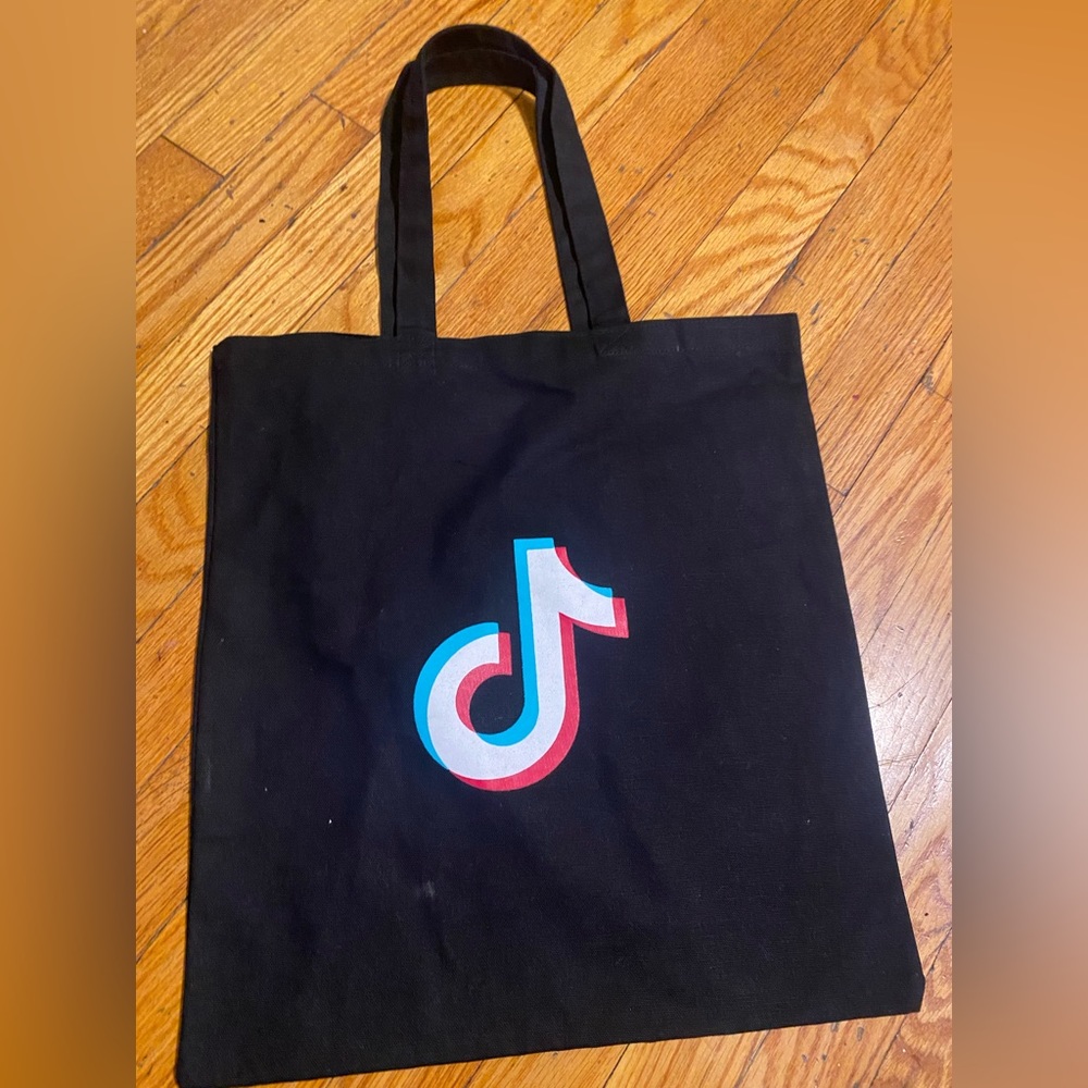 Authentic TIKTOK tote. Thick material, tote over the shoulder straps.